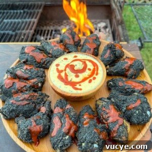 The smoked bat wings plated and served.