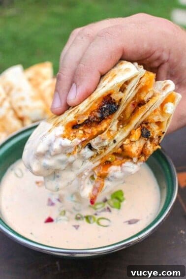 Dipped quesadillas in the ranch.