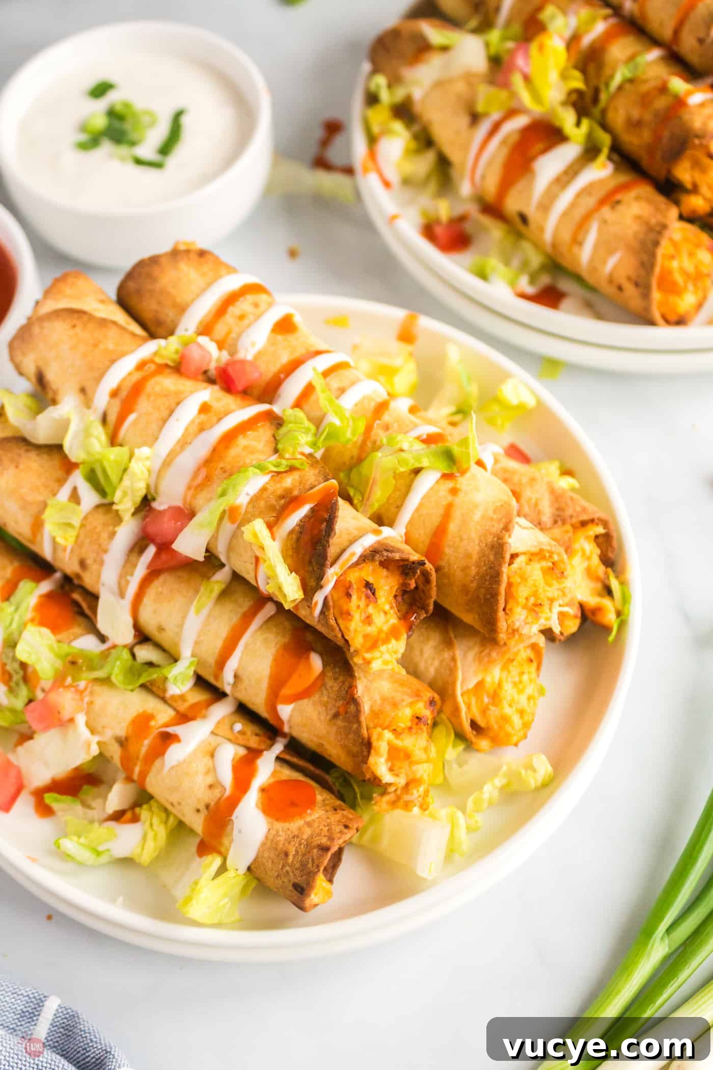 plate of buffalo chicken taquitos