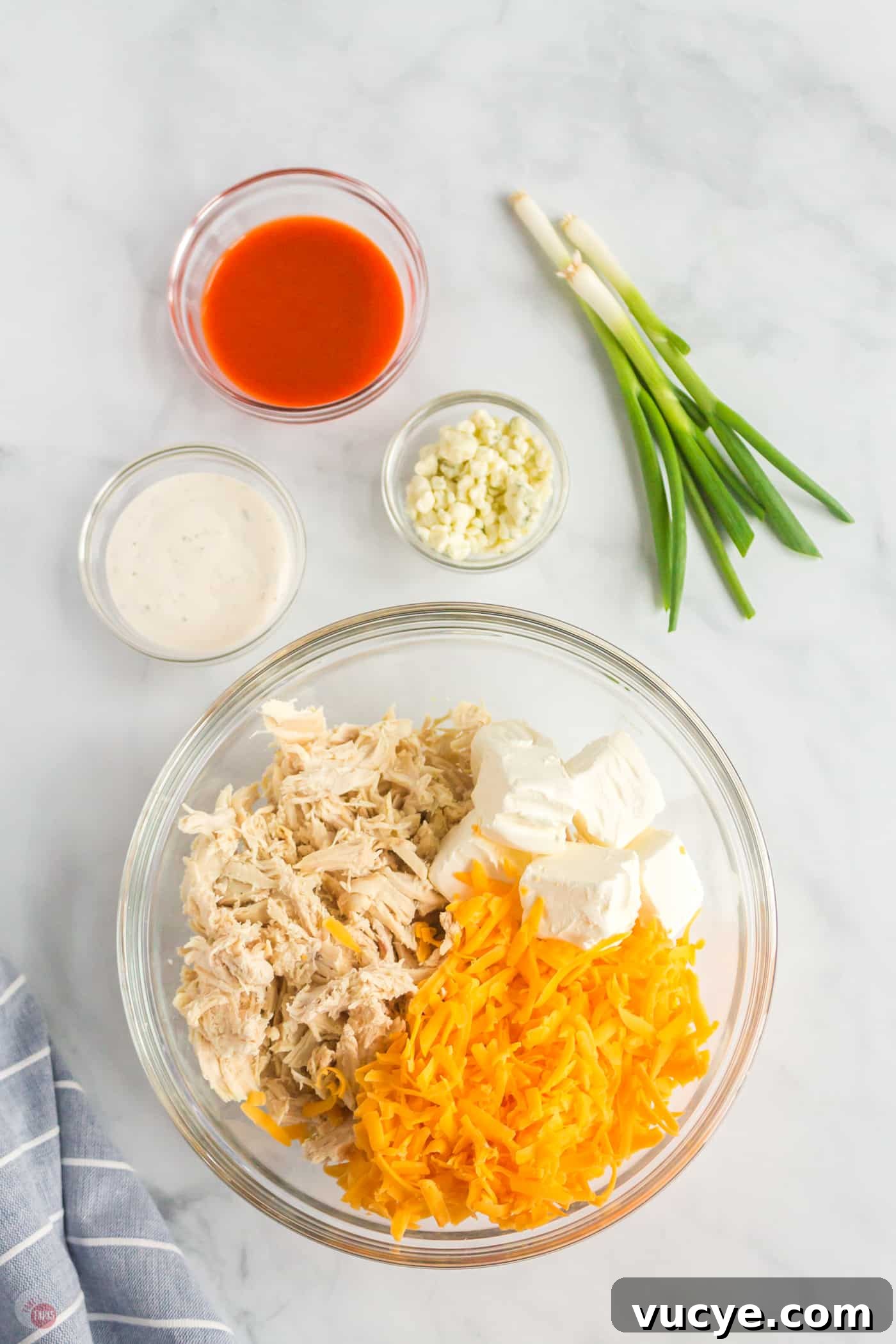 chicken and cheese in a bowl