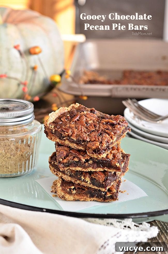 Autumn Dinner Recipes and Cozy Entertaining Ideas 3 Gooey Chocolate Pecan Pie Bars — a decadent fall treat.