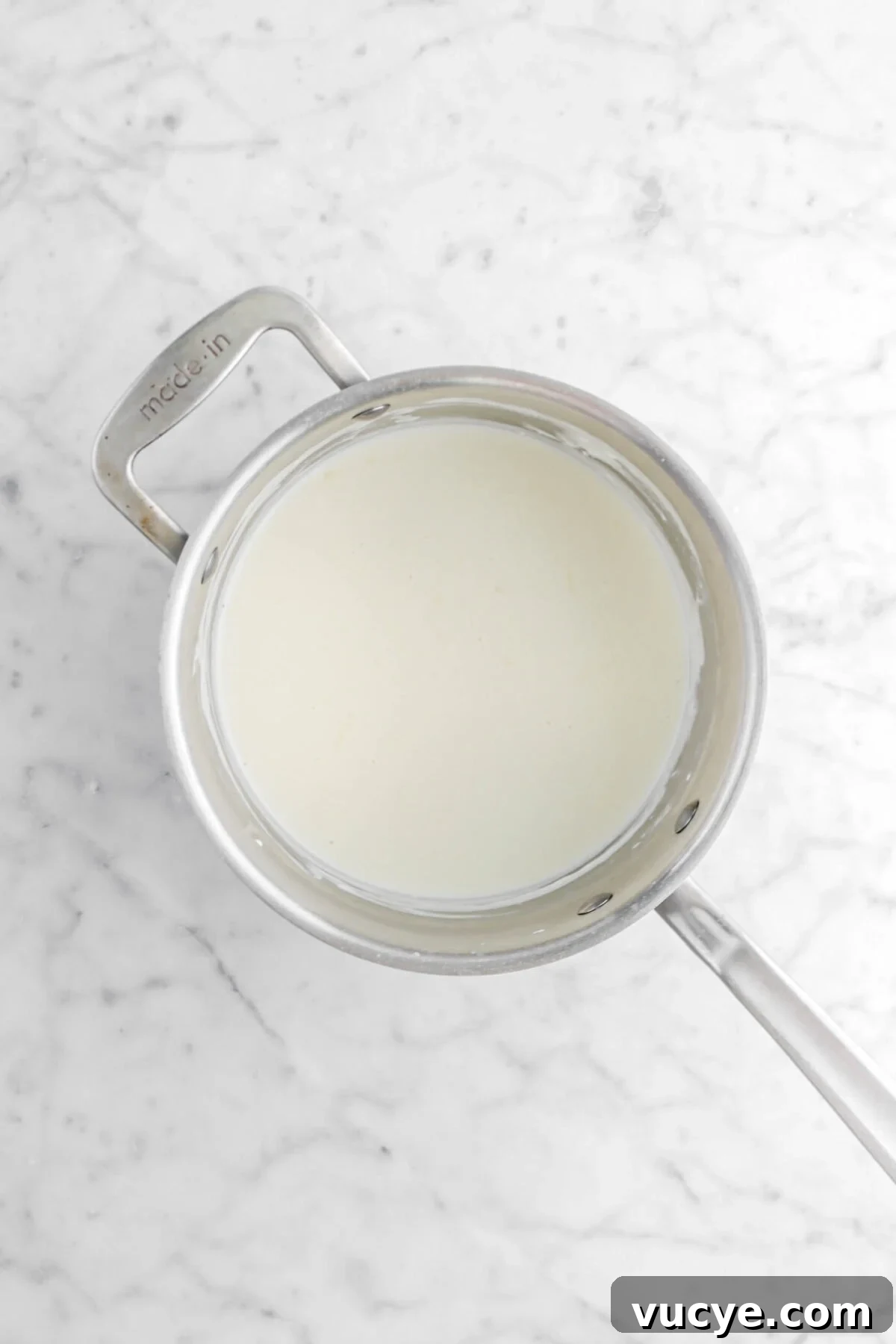 Creamy Four-Cheese Macaroni and Cheese Recipe 14 cream cheese stirred into milk mixture