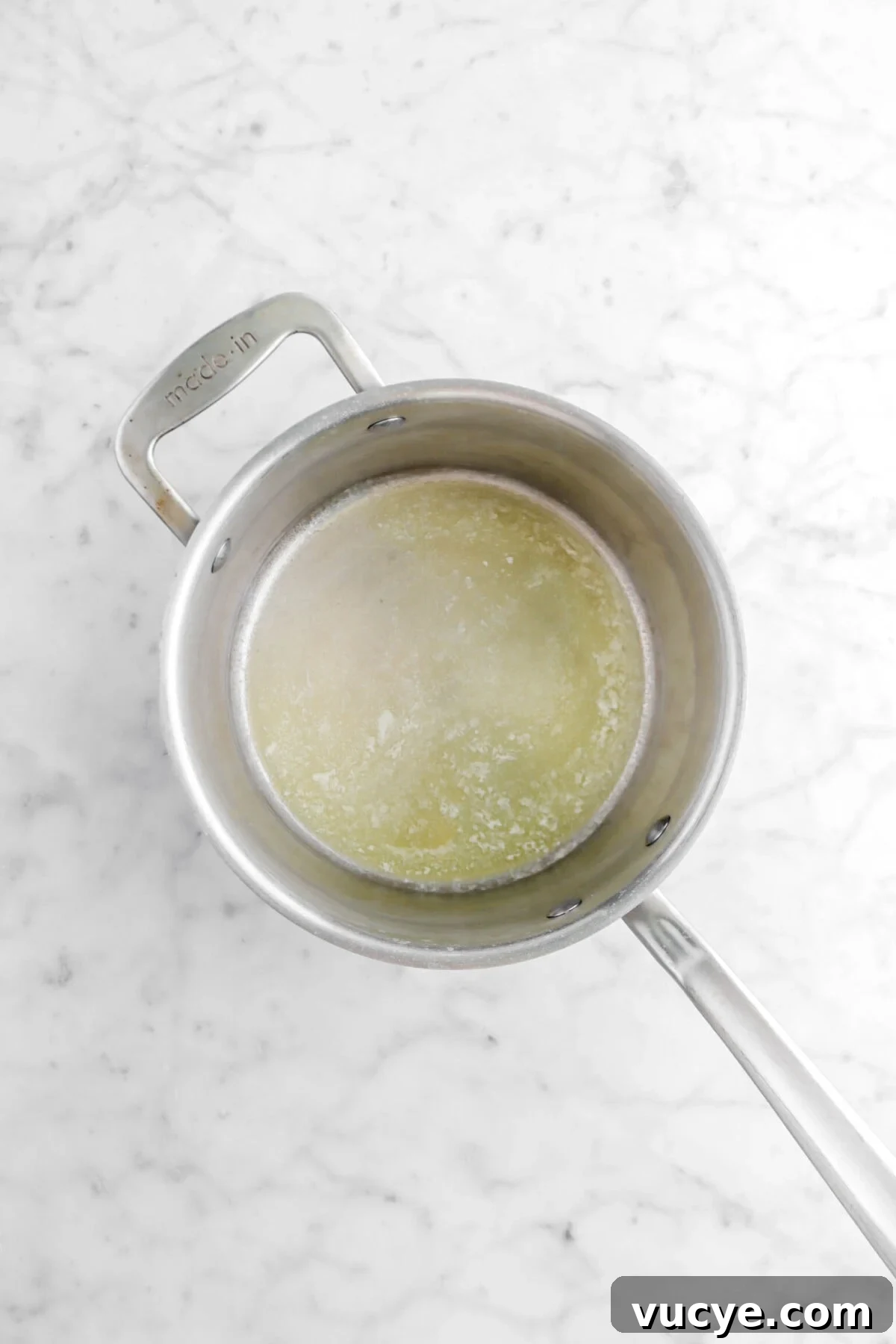 Creamy Four-Cheese Macaroni and Cheese Recipe 9 melted butter in small pot
