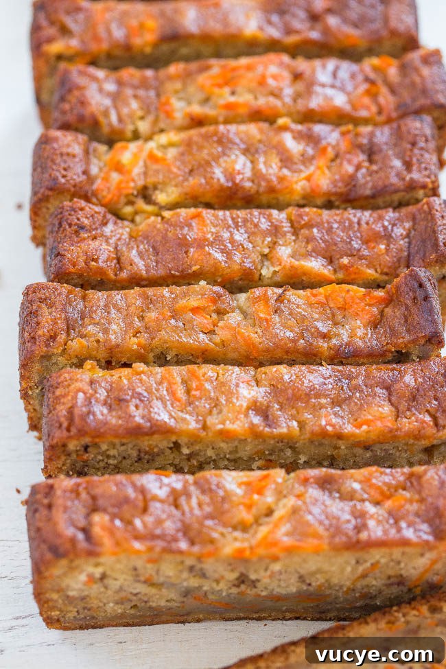 Carrot Cake Cupcakes with Vanilla Cream Cheese Frosting Recipe 13 A sliced Carrot Banana Bread loaf.