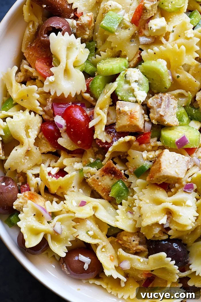 7-Day Family Meal Plan: Weekly Menu Ideas for Simple Dinners 5 Greek Chicken Pasta Salad Recipe - This easy pasta salad recipe is so easy and delicious! Made with grilled chicken, pasta, an assortment of vegetables and topped with feta cheese and a delicious Greek dressing! // addapinch.com