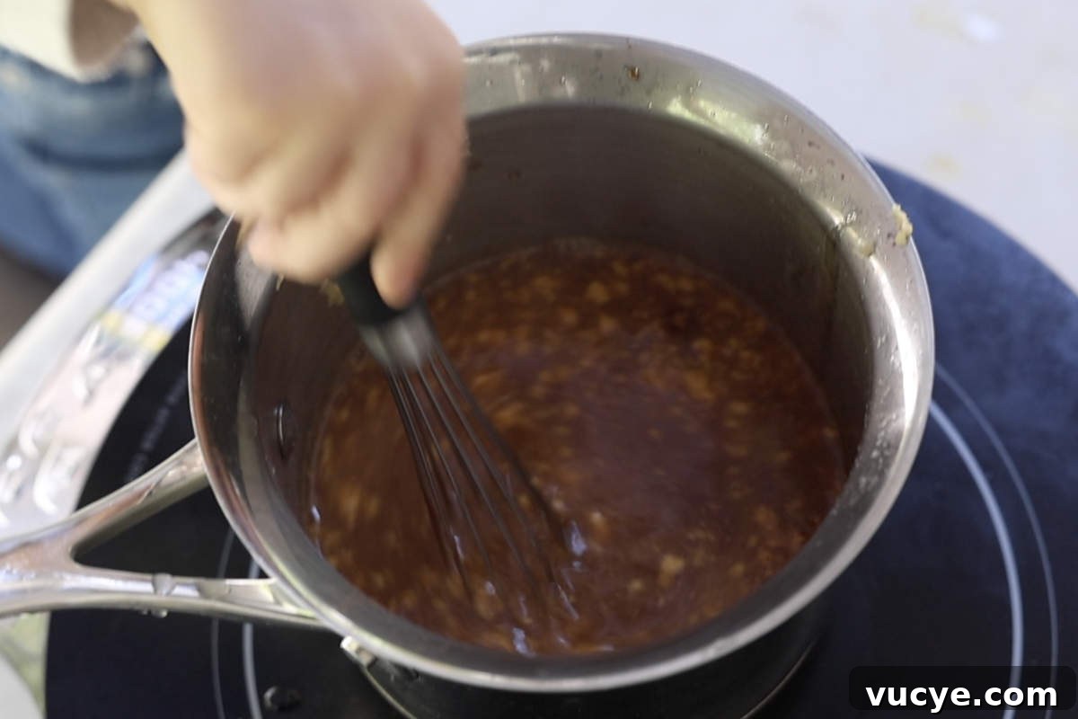 Double-Smoked Ham Techniques for Rich, Smoky Flavor 8 Simmering the glaze in a medium saucepan.