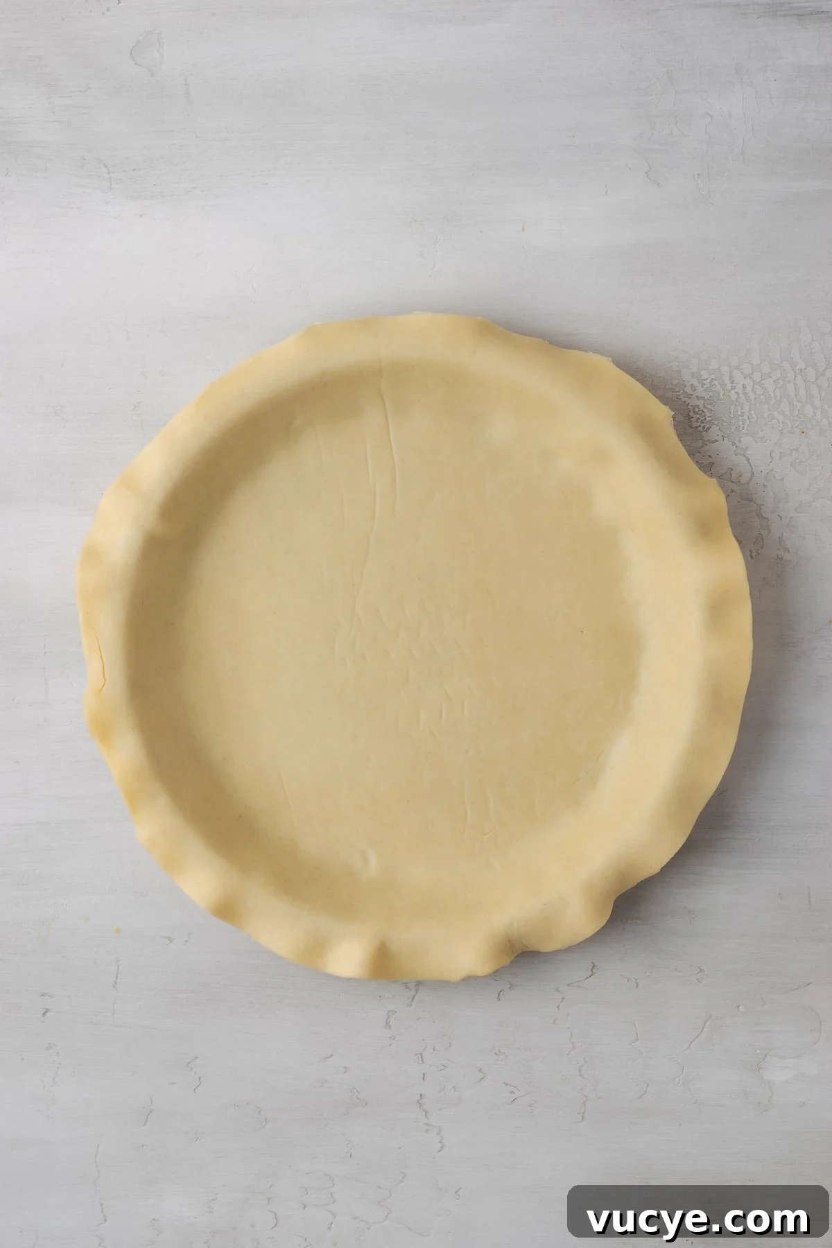 Prepare the crust. A flaky pie crust pressed into a 9-inch pie plate.