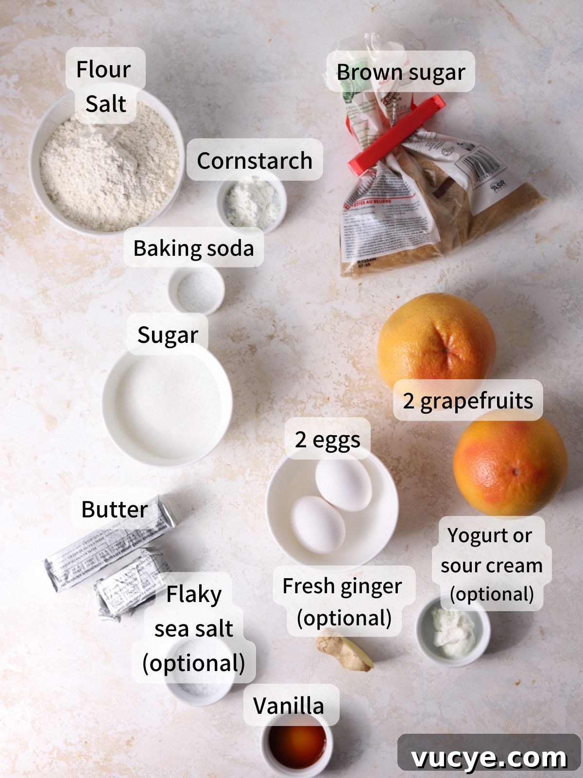 Zesty Grapefruit Cookies: Bright Citrus Cookie Recipe 3 Labeled ingredients needed to make grapefruit cookies laid out on a table.