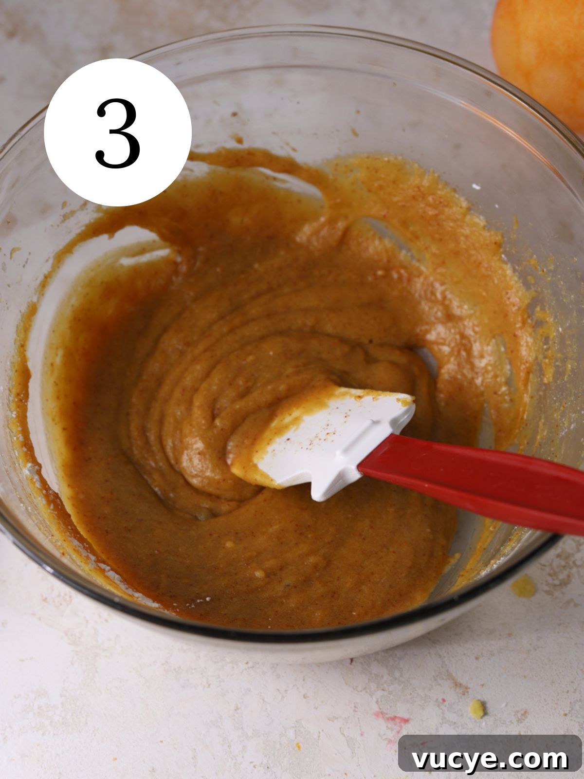 Zesty Grapefruit Cookies: Bright Citrus Cookie Recipe 6 Wet ingredients stirred together in a bowl with a spatula.