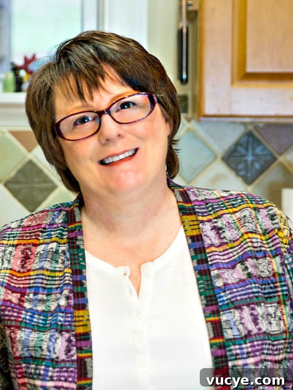 Crispy Puff Pastry Cheese Straws Recipe 9 Head shot of Jennifer Field.