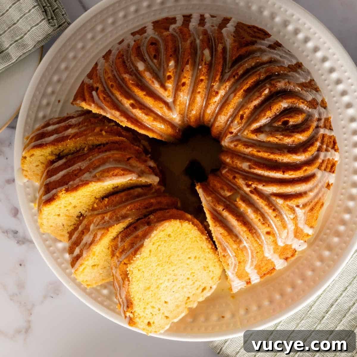 Birds eye view of sweet potato pound cake baked in bundt pan and sliced.
