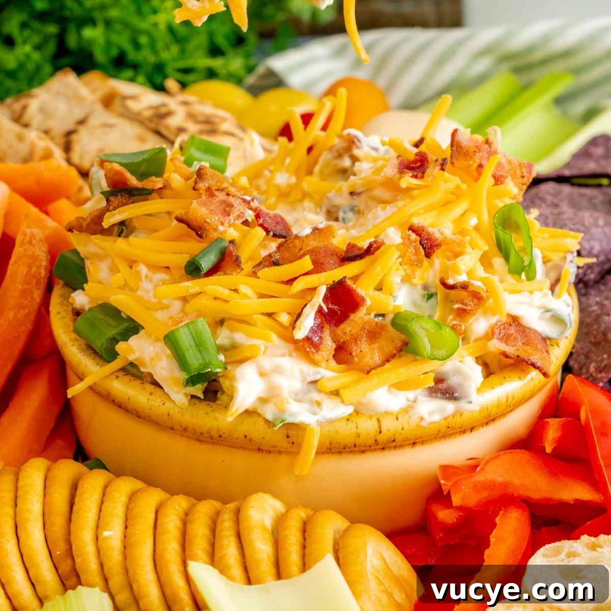 A serving bowl full of million dollar dip featured image
