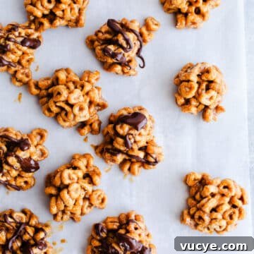 3-Ingredient Peanut Butter Cereal Bites Recipe 13 Peanut butter bites on a baking sheet.