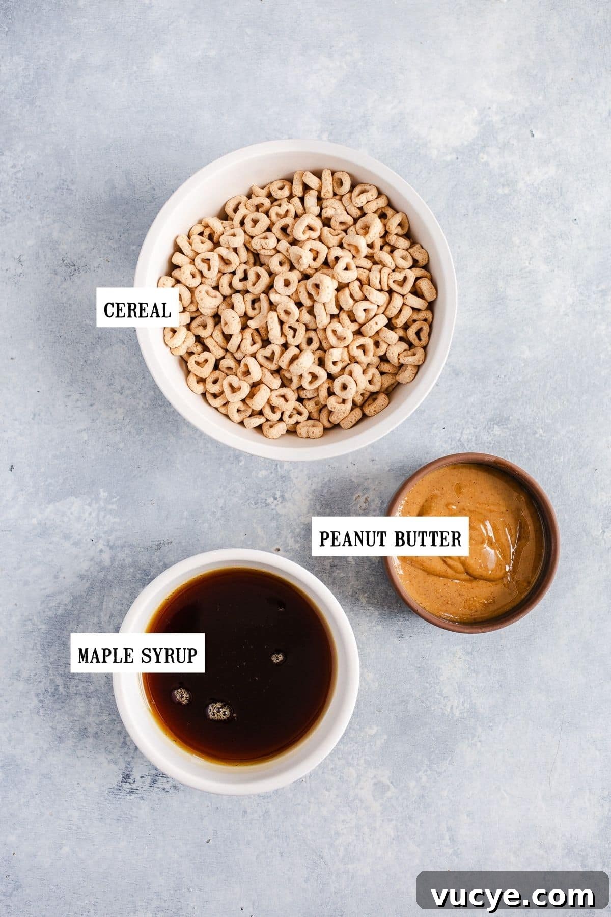 3-Ingredient Peanut Butter Cereal Bites Recipe 3 Ingredients for snack bites in small bowls.