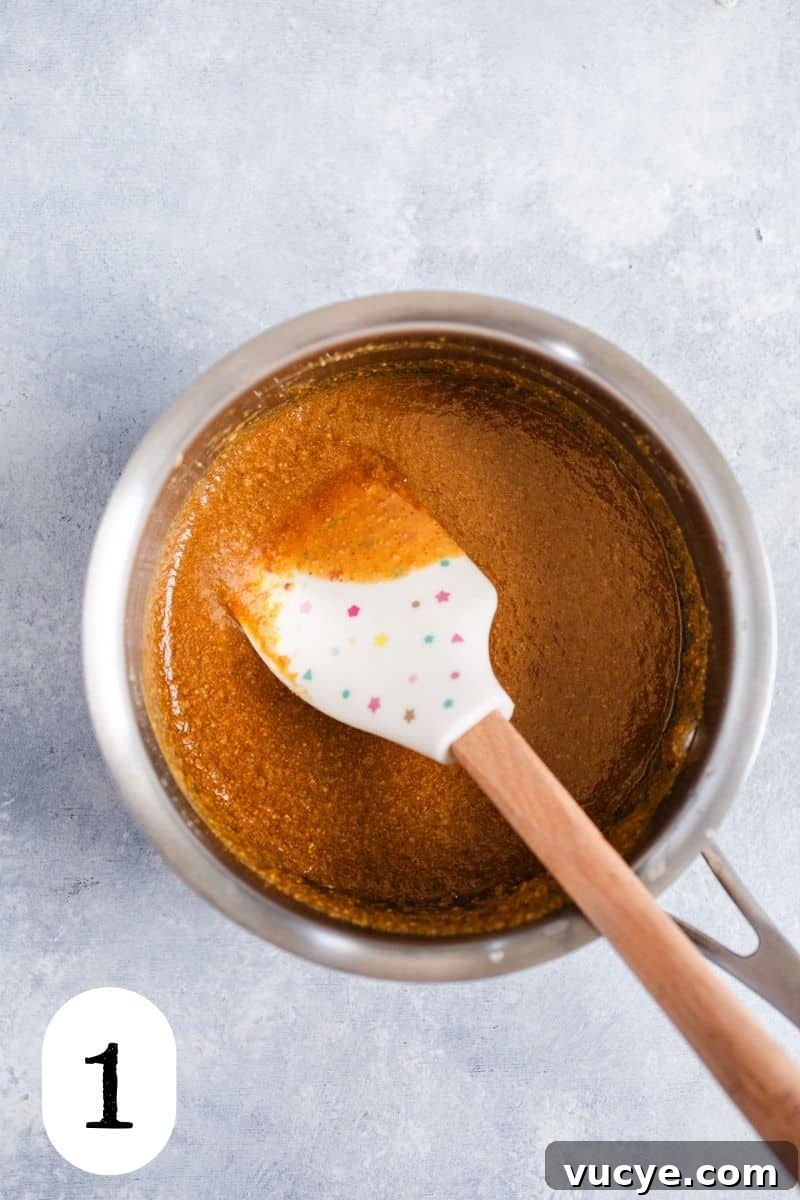 3-Ingredient Peanut Butter Cereal Bites Recipe 4 Melted peanut butter in a small saucepan.