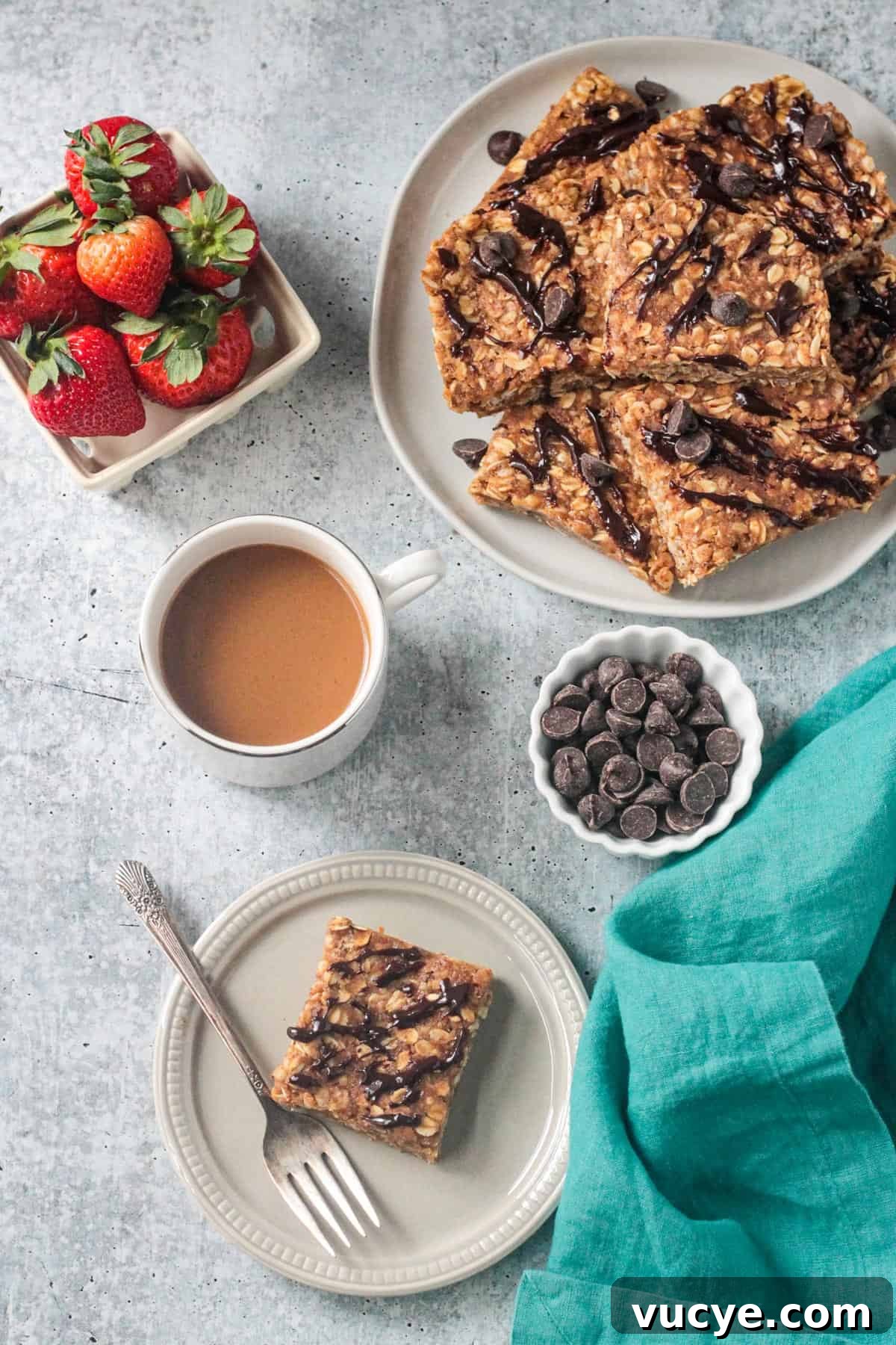 No-Bake Peanut Butter Oat Bars — Chewy, Gluten-Free Snack 2 One peanut butter oatmeal bar on a plate with a fork next to a cup of coffee.