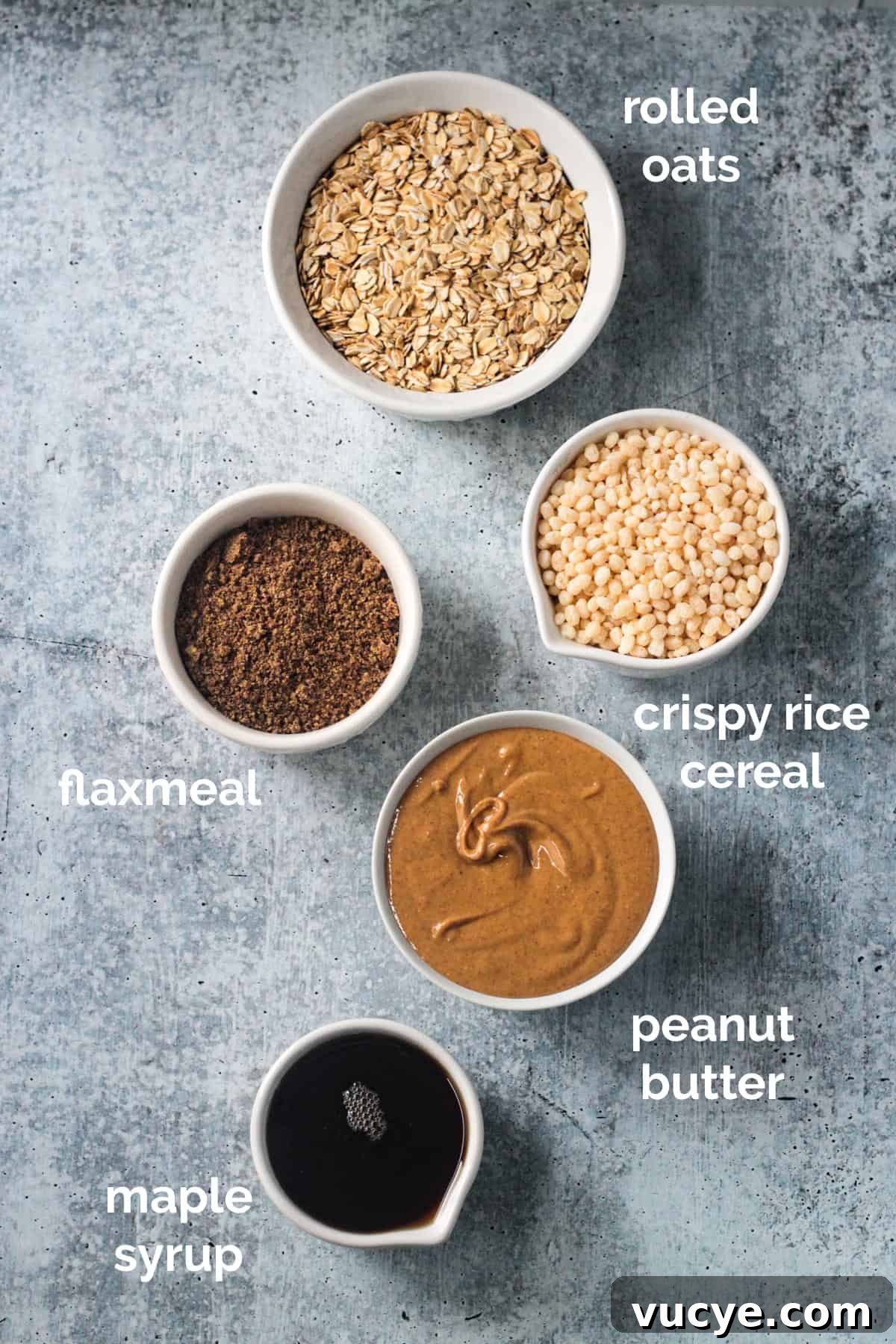 No-Bake Peanut Butter Oat Bars — Chewy, Gluten-Free Snack 3 Recipe ingredients arrayed in individual bowls.
