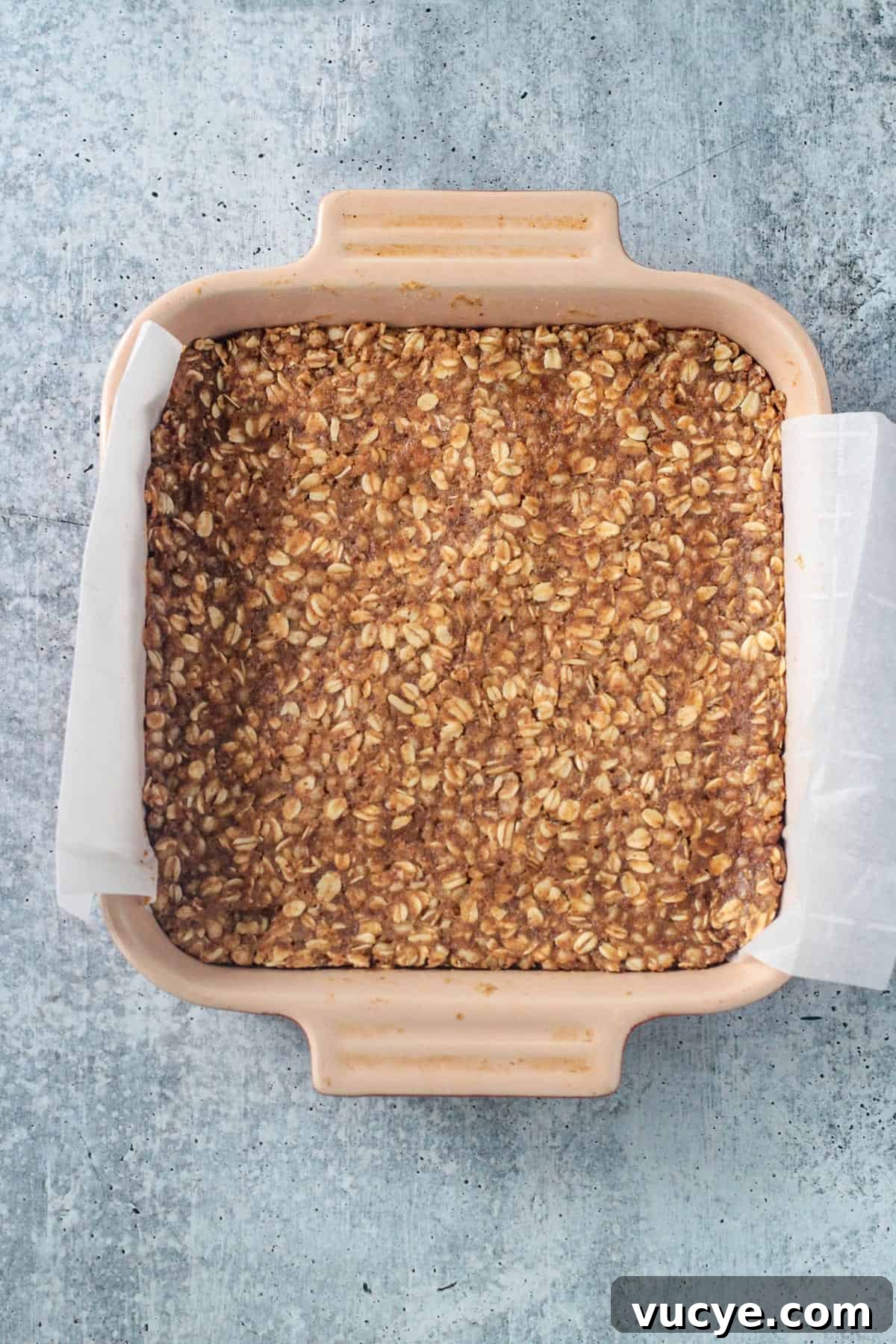 No-Bake Peanut Butter Oat Bars — Chewy, Gluten-Free Snack 5 Batter in a square baking pan.