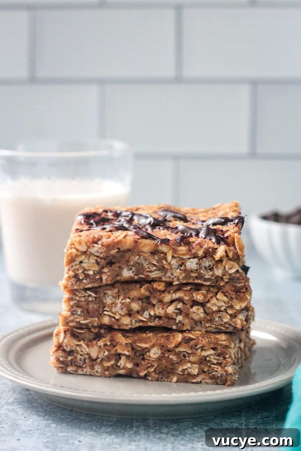 No-Bake Peanut Butter Oat Bars — Chewy, Gluten-Free Snack 7 Stack of 3 peanut butter oatmeal bars.