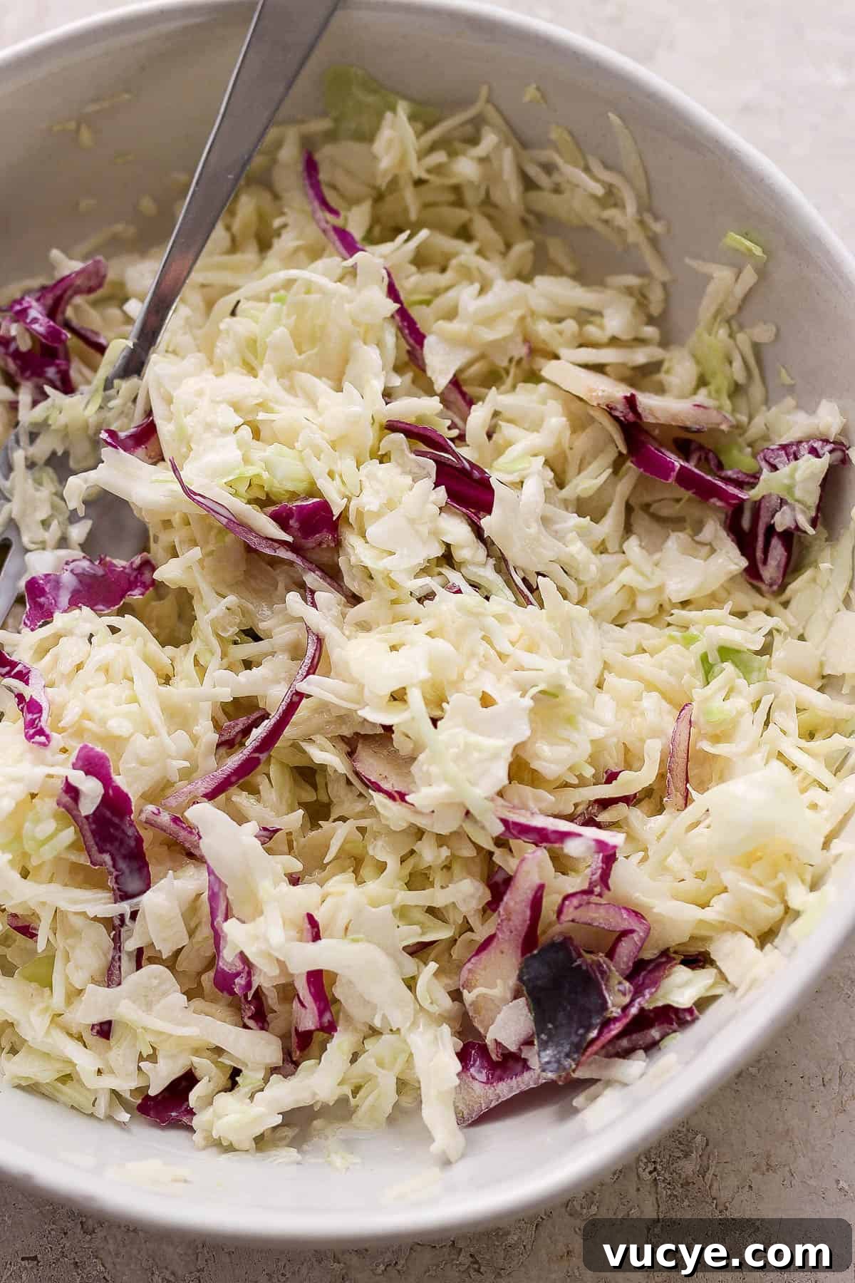 Crispy Cod Tacos with Zesty Slaw and Lime Crema 5 Creamy slaw in a bowl.