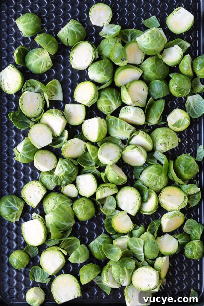 sliced brussels sprouts on a sheet pan