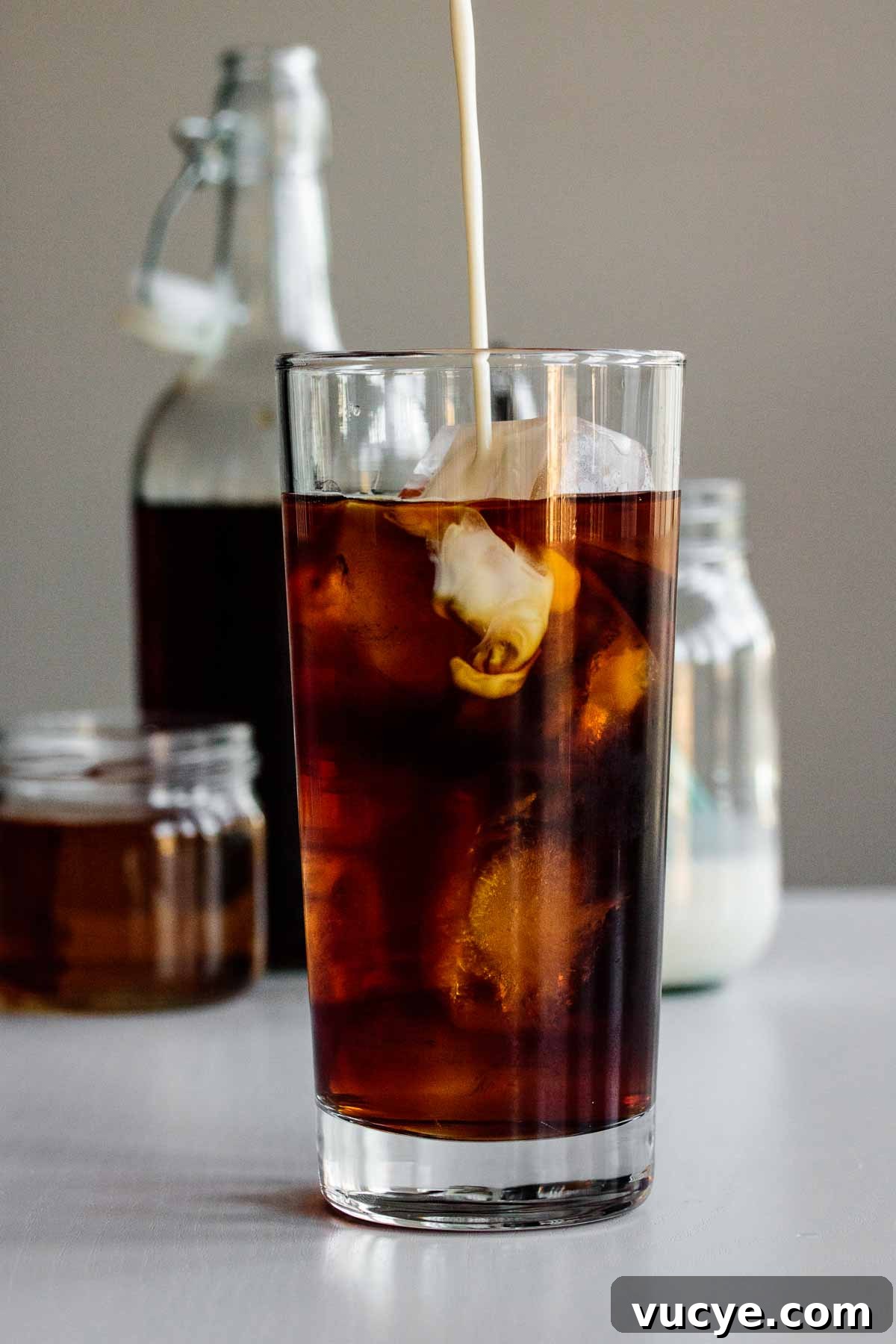 Starbucks Vanilla Sweet Cream Cold Brew Recipe & Tips 4 vanilla sweet cream being poured into cold brew glass