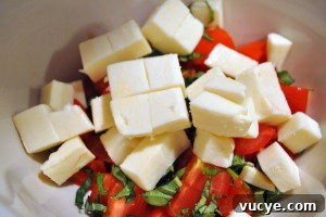 Caprese Salad: Fresh Tomato, Mozzarella & Basil Recipe 18 Layer tomatoes and mozzarella on a platter, tucking basil in between.
