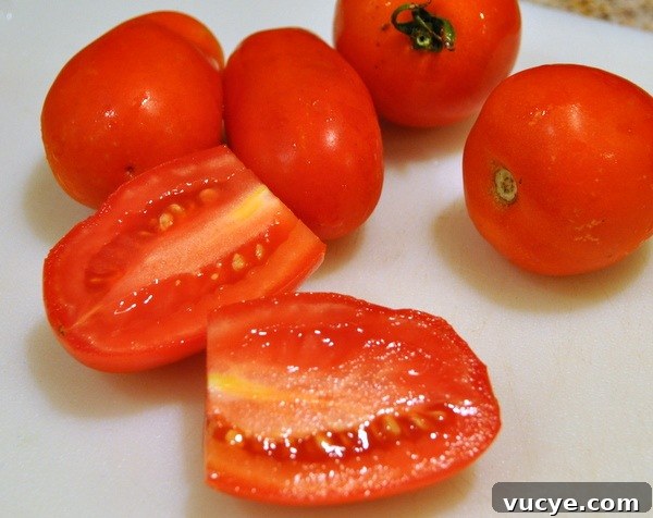 Caprese Salad: Fresh Tomato, Mozzarella & Basil Recipe 6 Wash and slice them—halved if using cherry/grape or sliced into wedges for larger tomatoes.