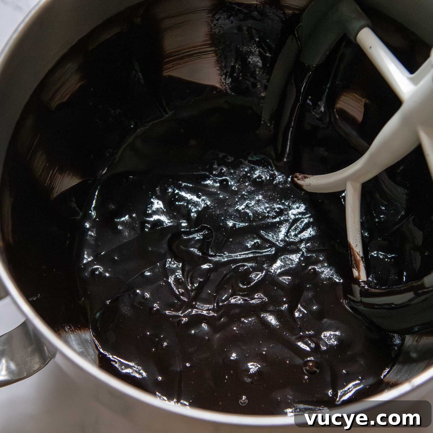 Chocolate cake batter being mixed.