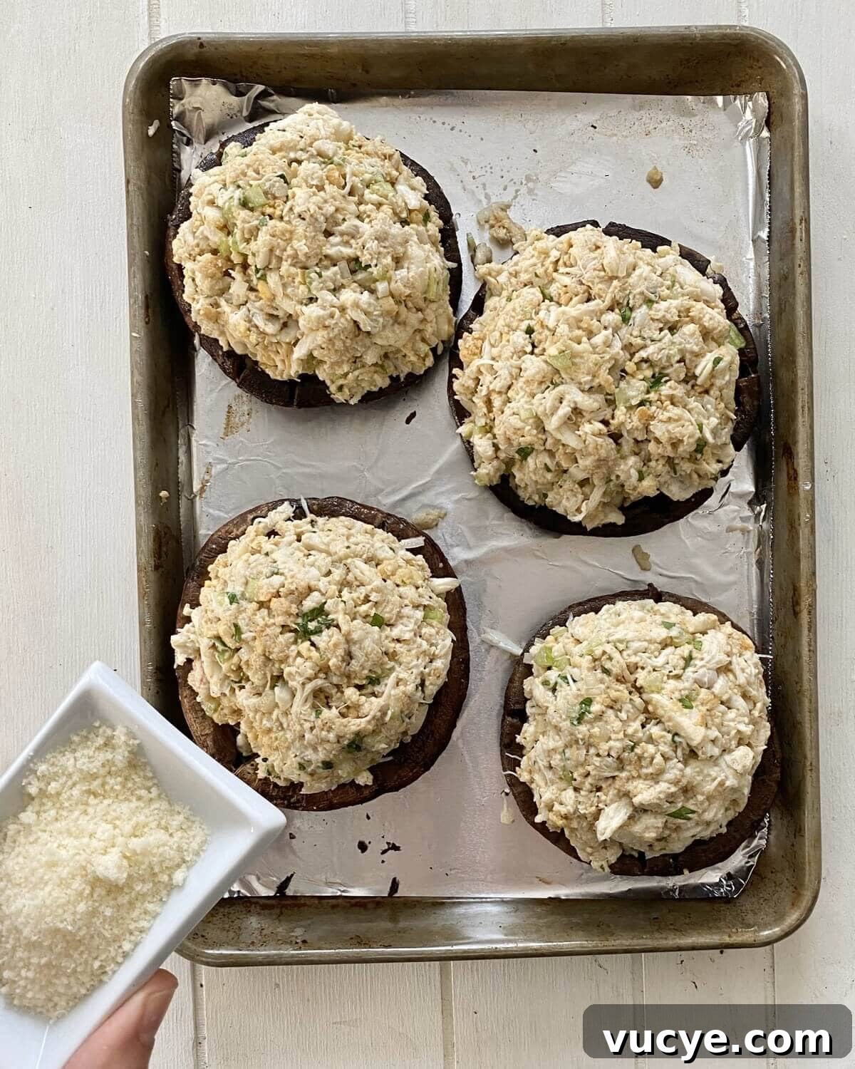 Crab-Stuffed Portobello Mushrooms with Garlic Herb Filling 10 parmesan cheese and crab stuffed mushroom caps.