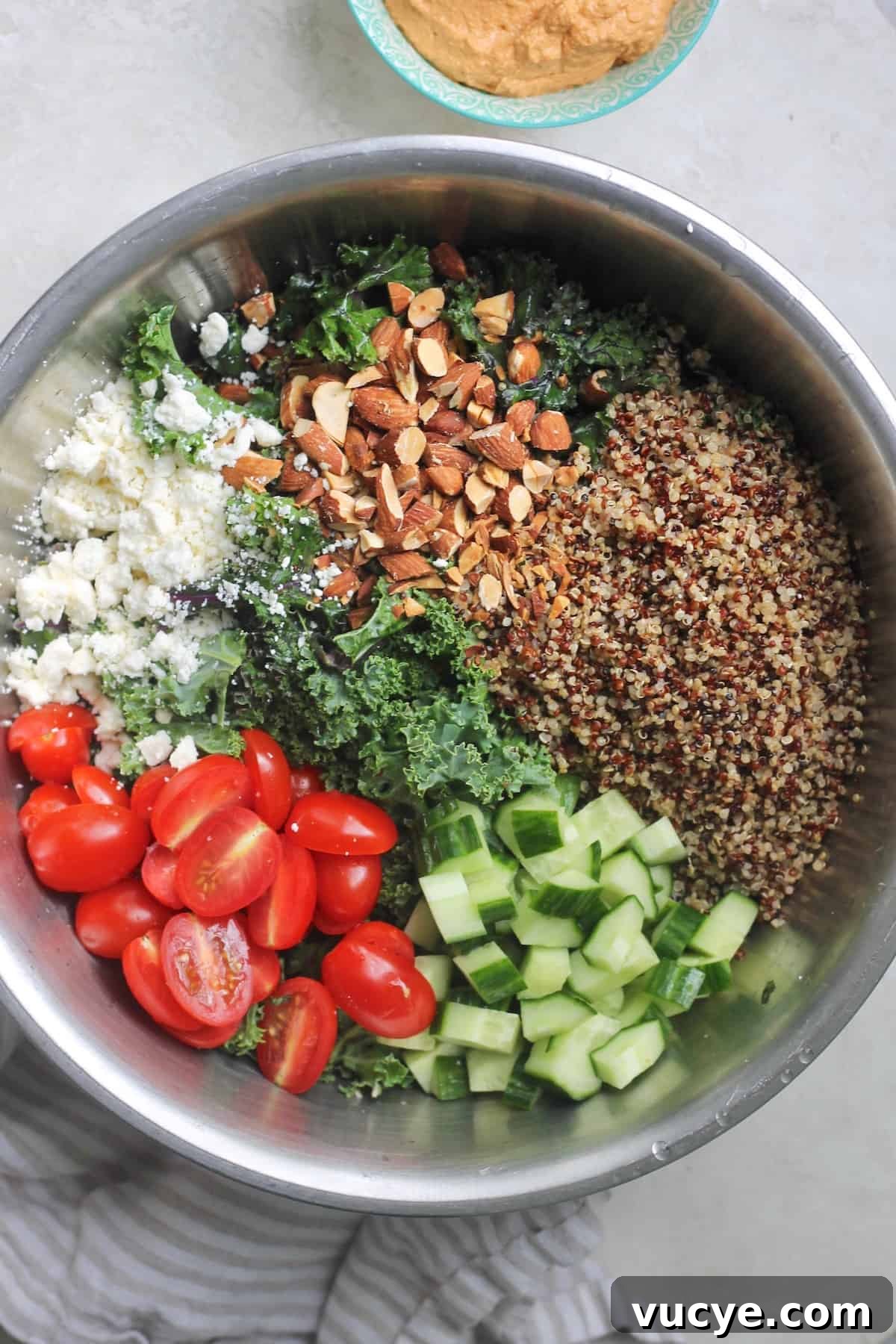 mixing bowl with salad ingredients.