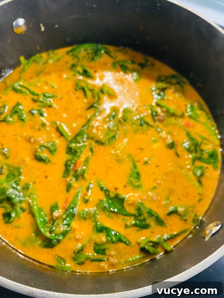 Creamy Italian Sausage and Kale Soup Recipe 8 Soup after adding cheese and spinach