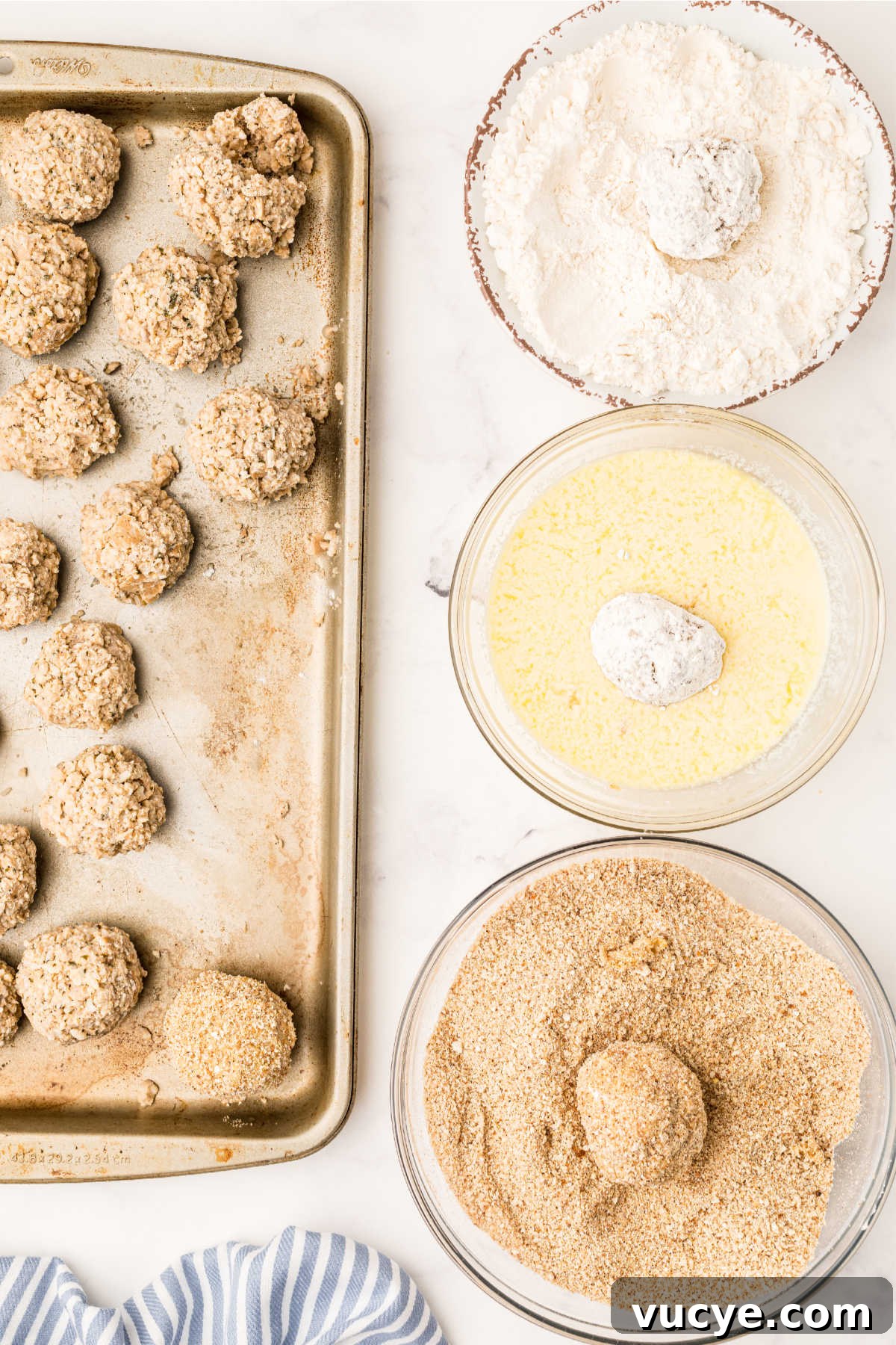 Crispy Fried Boudin Balls: Where to Find & How to Enjoy 10 A dredging station with flour, egg wash and breadcrumbs.