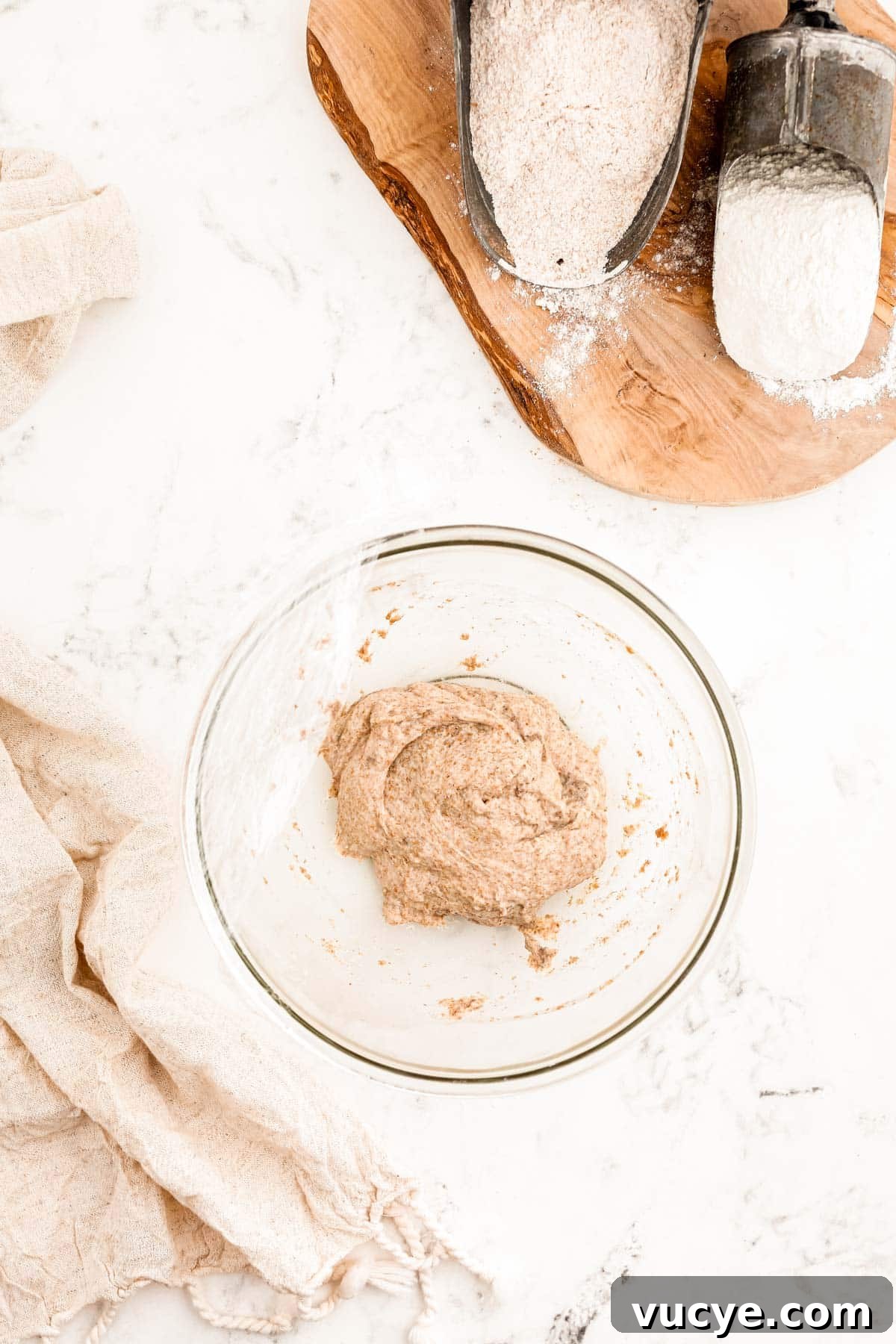 Create a Sourdough Starter at Home: Step-by-Step Guide 7 Day 2 of a sourdough starter in a glass bowl.