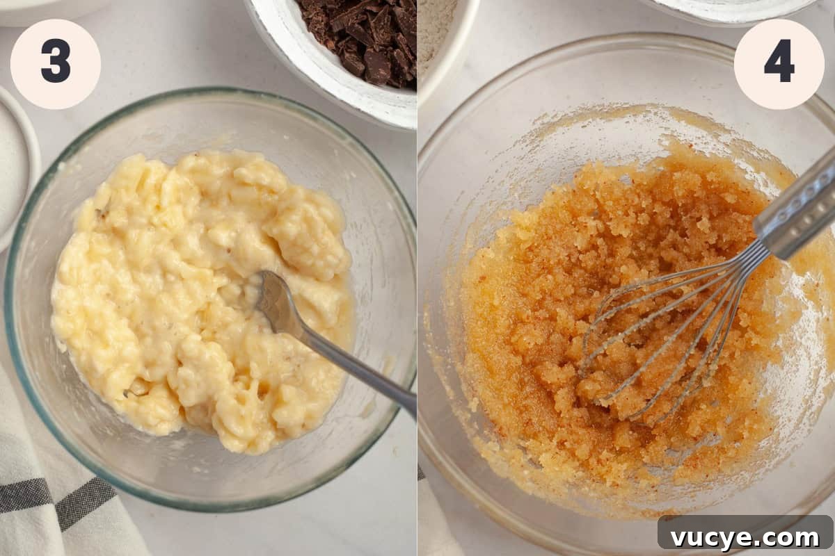 Bakery-Style Chocolate Chunk Banana Muffins Recipe 6 A glass bowl with mashed banana in it and another bowl with a whisk and a brown mixture in it.