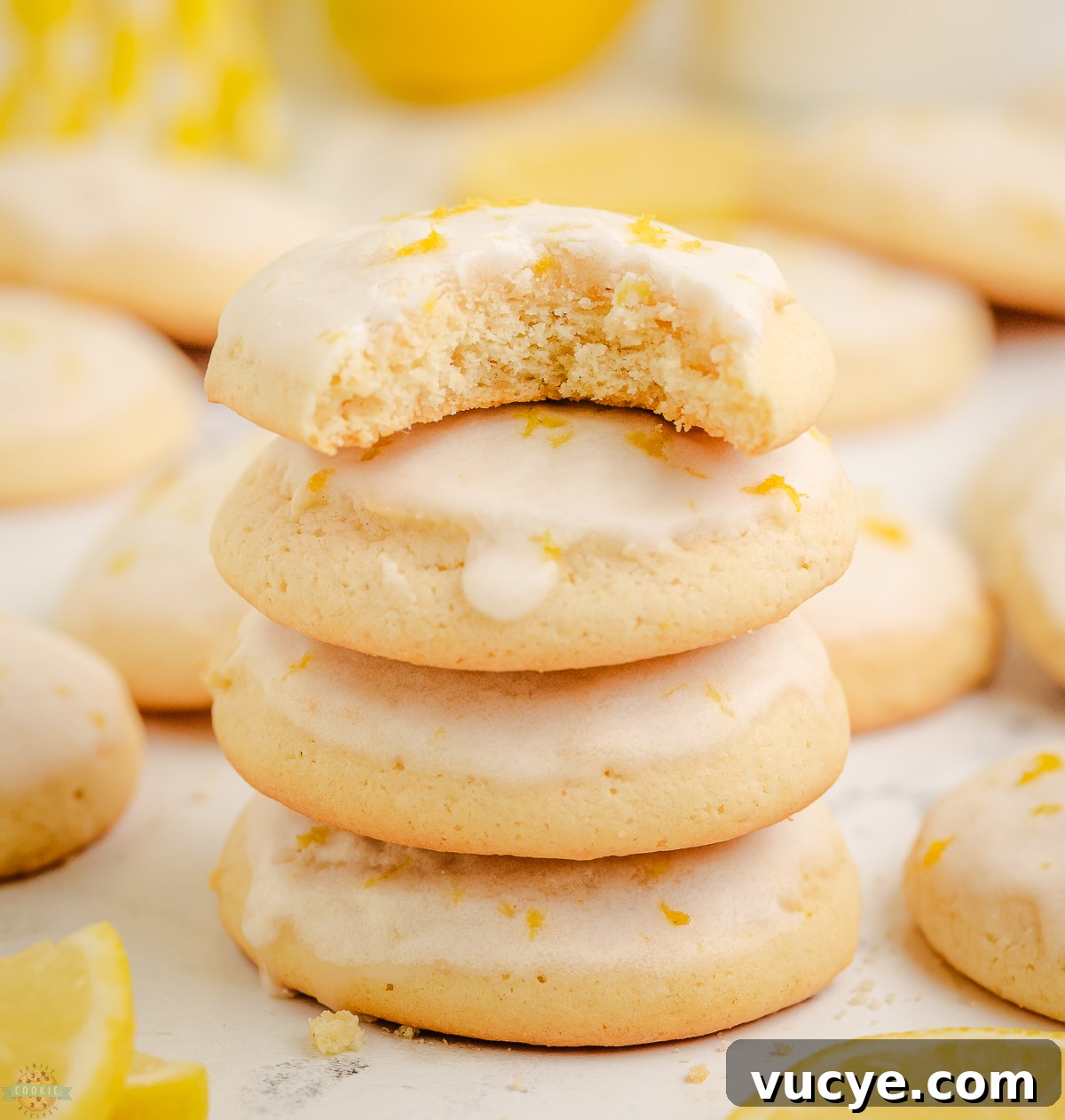 stack of buttermilk lemon cookies with a bite taken out