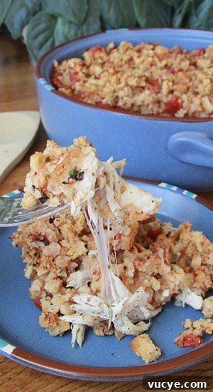 Stringy melted mozzarella in a bite with chicken and stuffing.