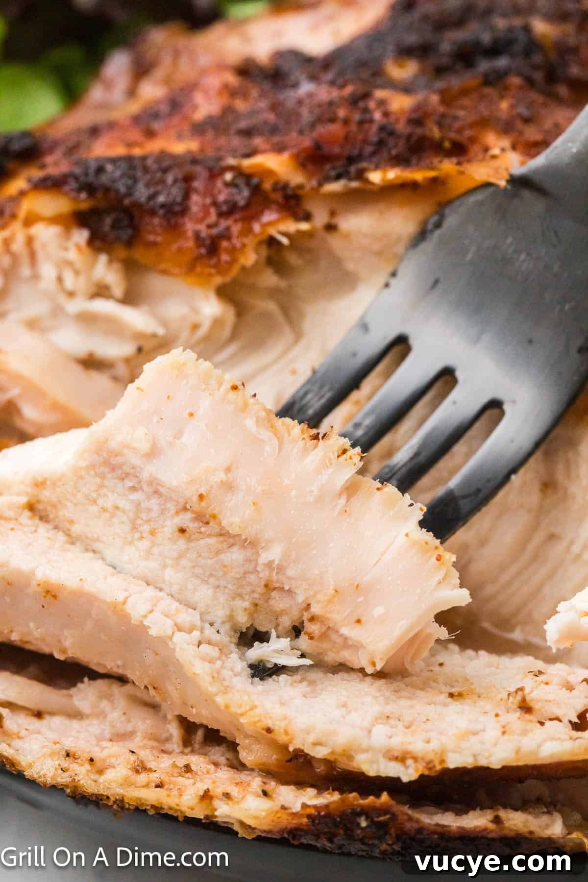 Smoked Bone-In Chicken Breasts Recipe for Juicy, Flavorful Meat 10 Smoked chicken breast sliced with a fork