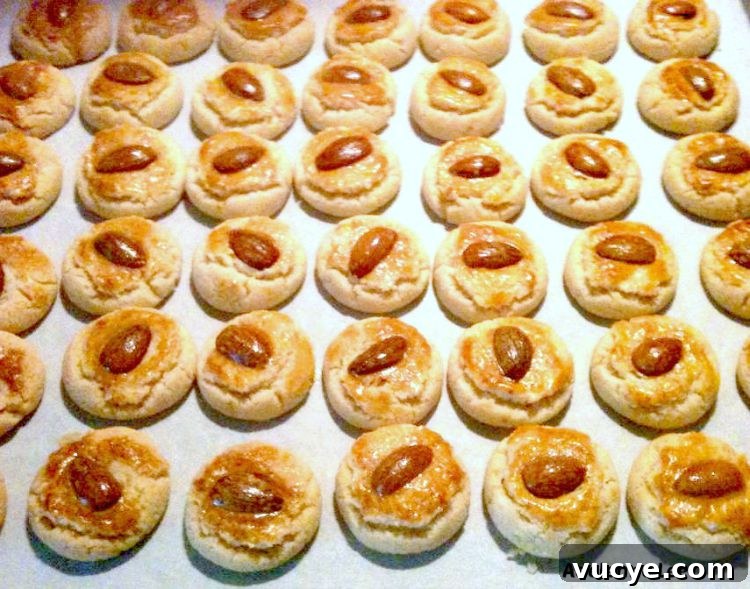Classic Chinese Almond Cookies: Recipe & Baking Tips 3 Chinese Almond Cookies are simple little cookies, traditionally made for Chinese New Year. These cookies are soft, fluffy, and crumbly. The shape symbolizes coins and will give you good fortune in the coming new year!