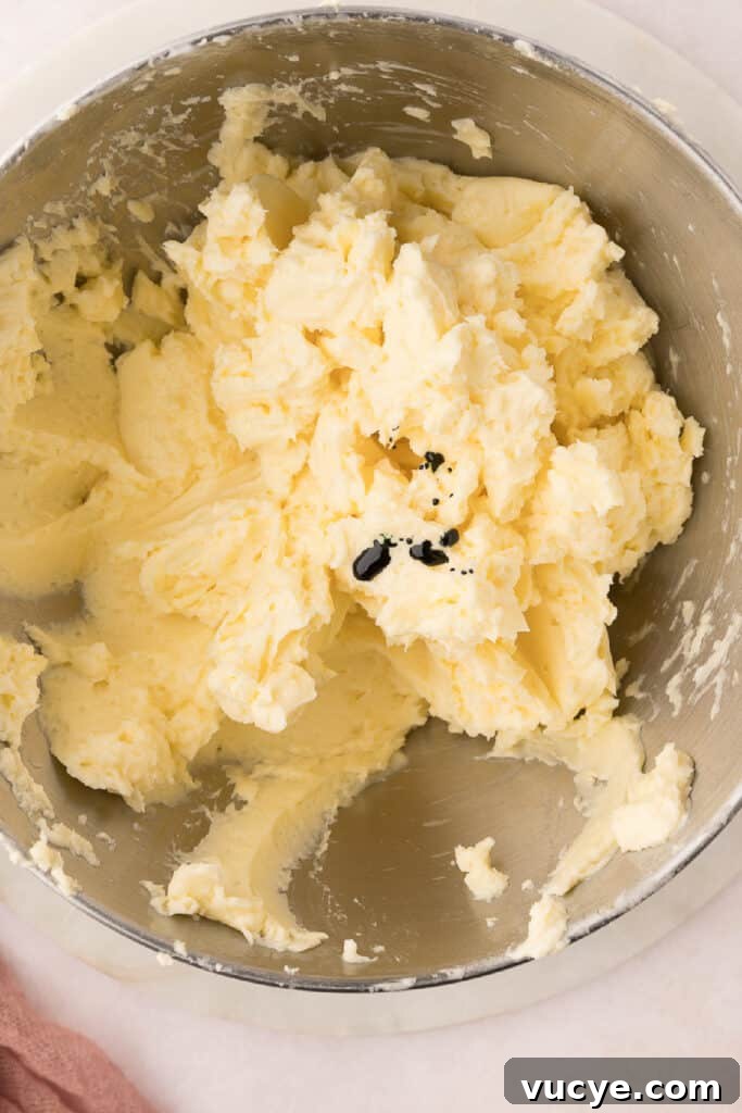 Silky Swiss Meringue Buttercream Recipe for Perfect Frosting 12 Add food coloring (if desired) ...