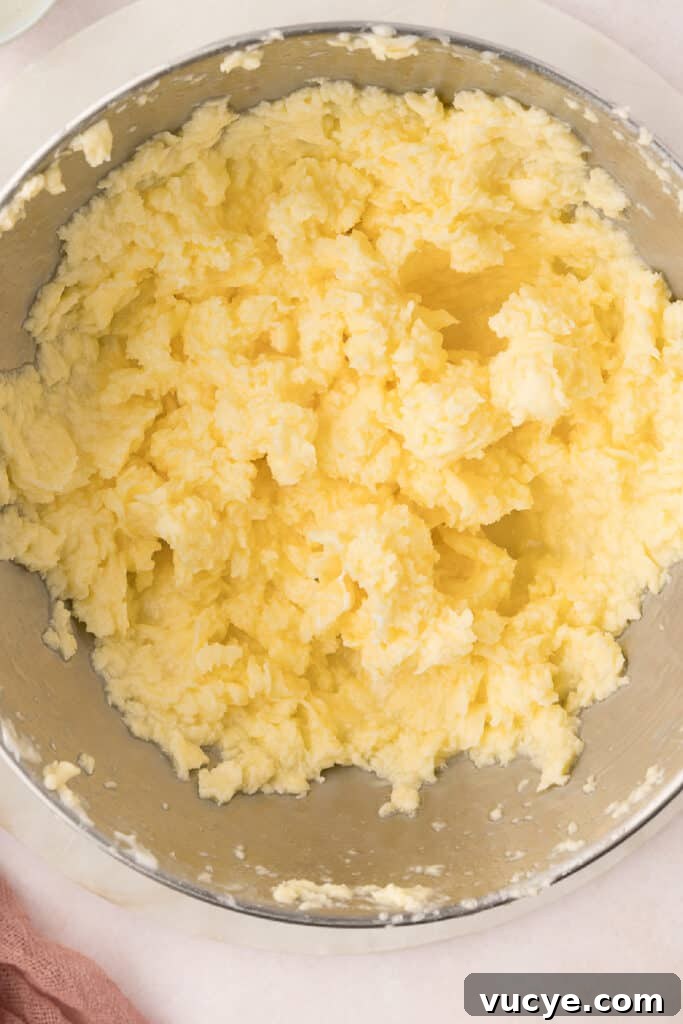 Silky Swiss Meringue Buttercream Recipe for Perfect Frosting 10 At this point, the mixture will look split. Do not panic!