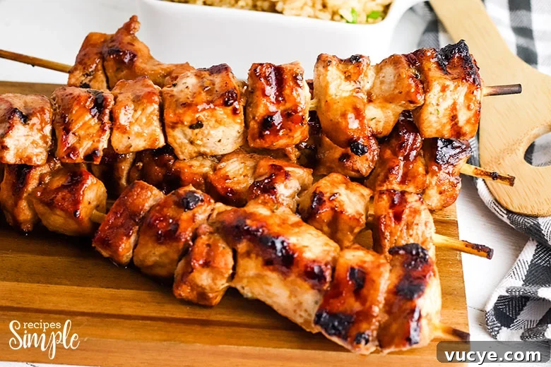 Grilled Pork Kabobs on wooden serving tray