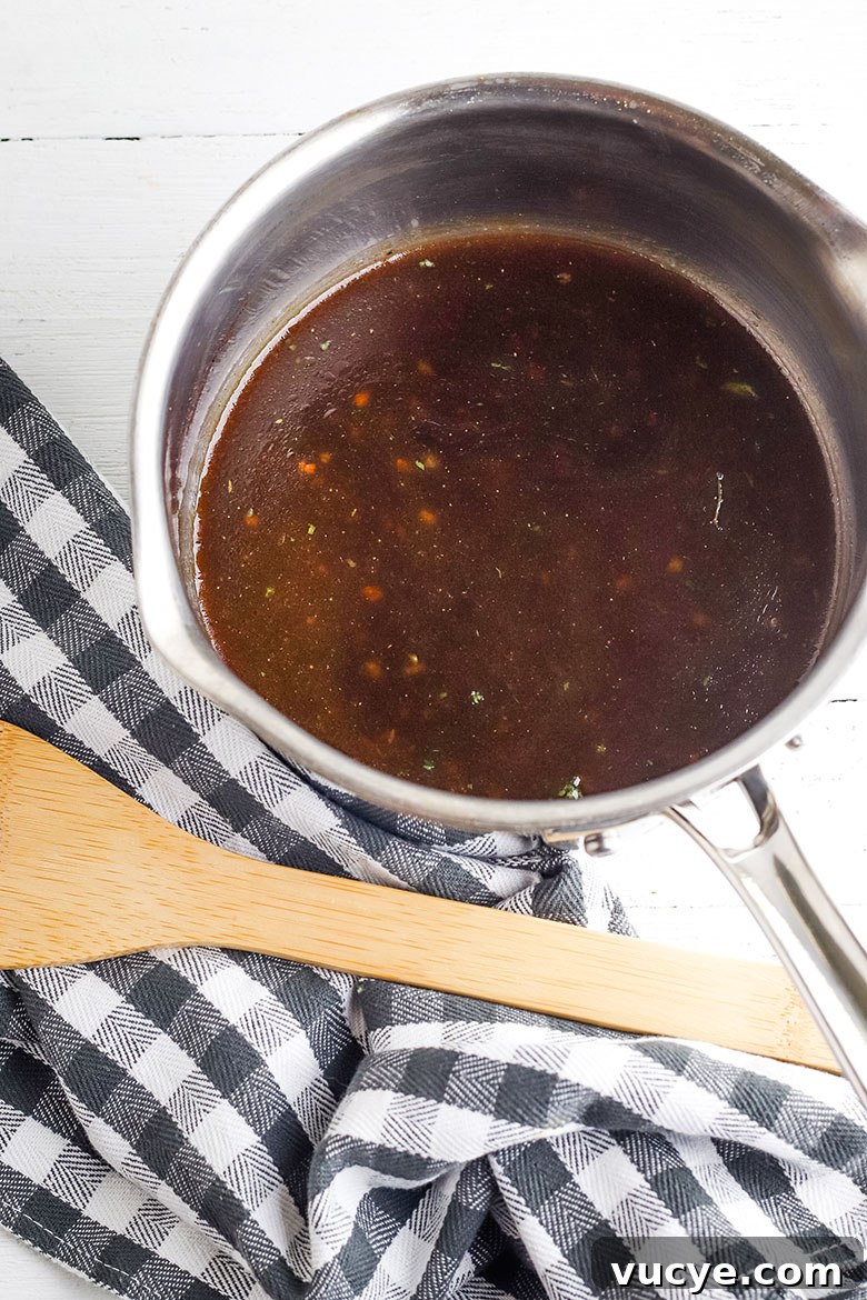 Asian Marinade in Saucepan Simmering on Stove