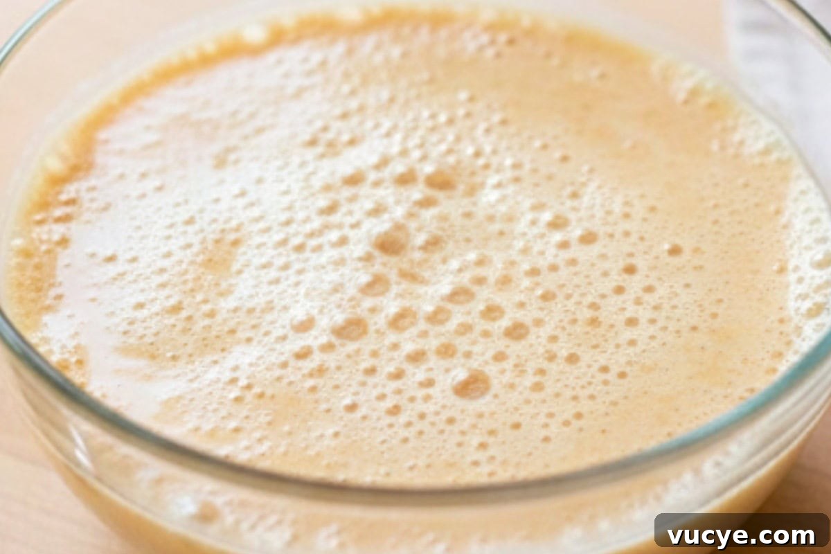 In a small bowl, mix the yeast with warm milk and 2 teaspoons of sugar.