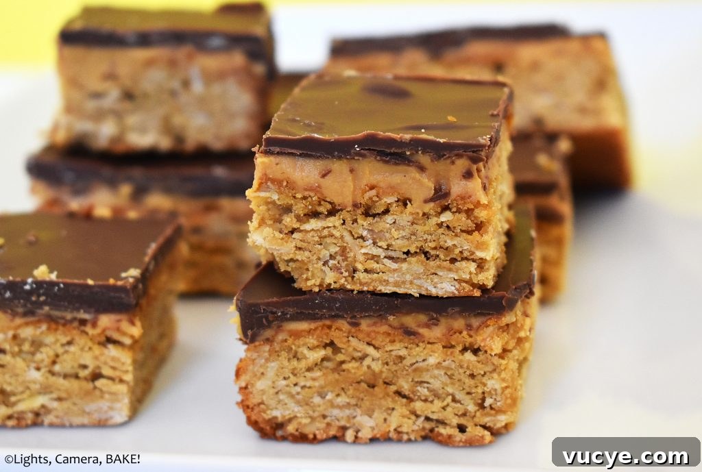 Peanut butter oat slice on a white plate.
