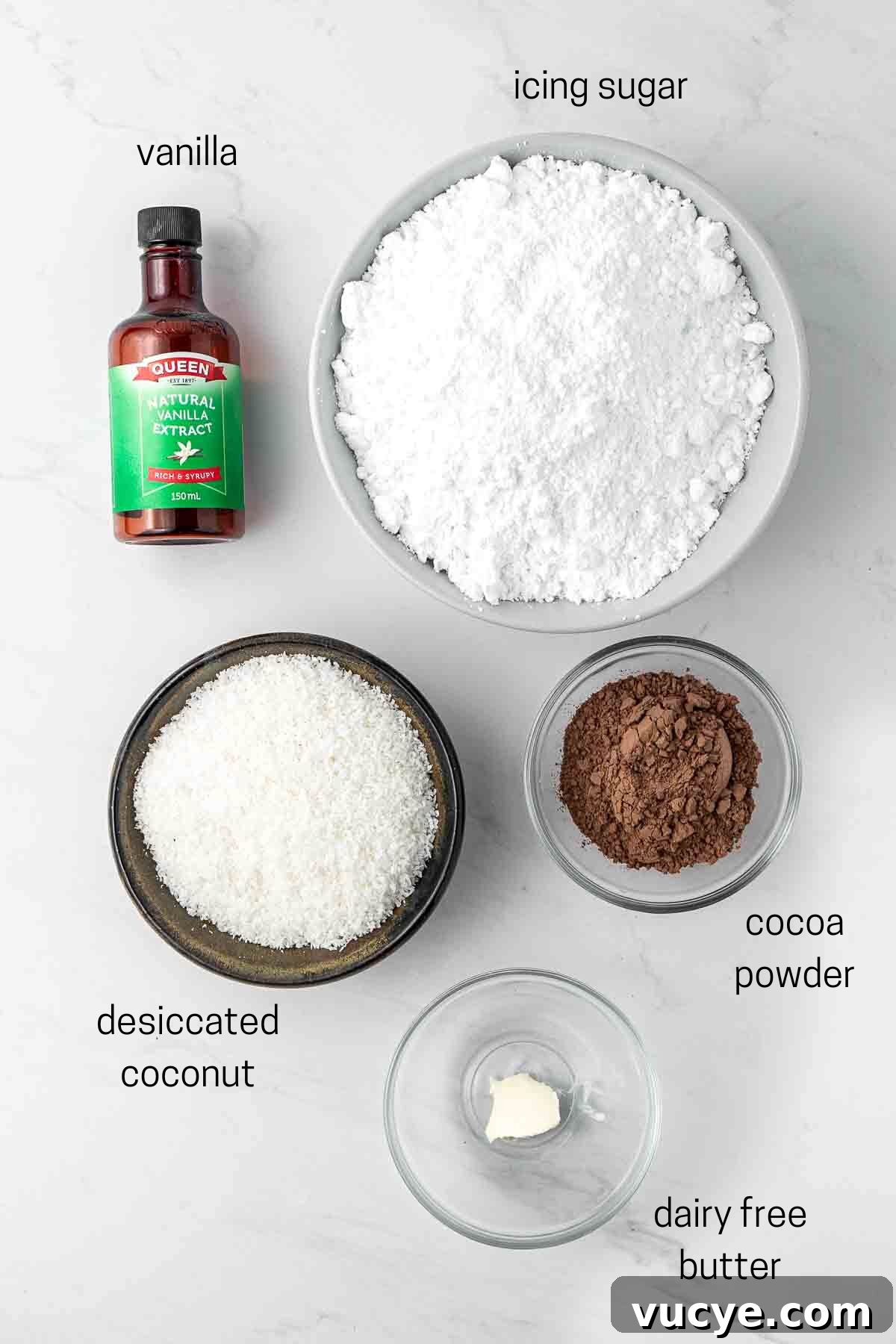 Classic Australian Lamington Recipe: Moist Sponge Cakes with Chocolate & Coconut 5 All ingredients needed for lamingtons laid out in small bowls.