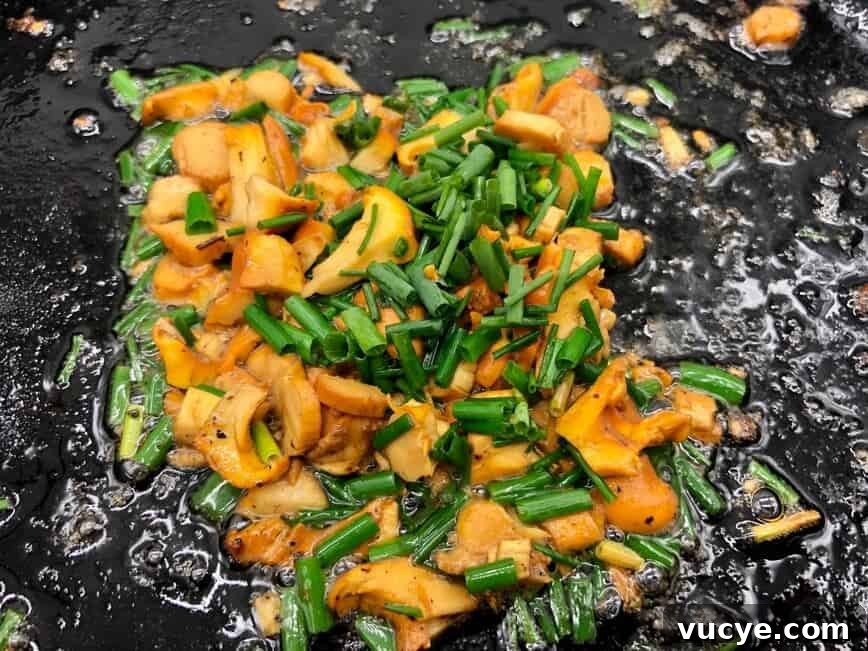 Where to Forage and How to Cook Chanterelle Mushrooms 7 Sauteing chanterelles with oil, butter, salt, and chives.