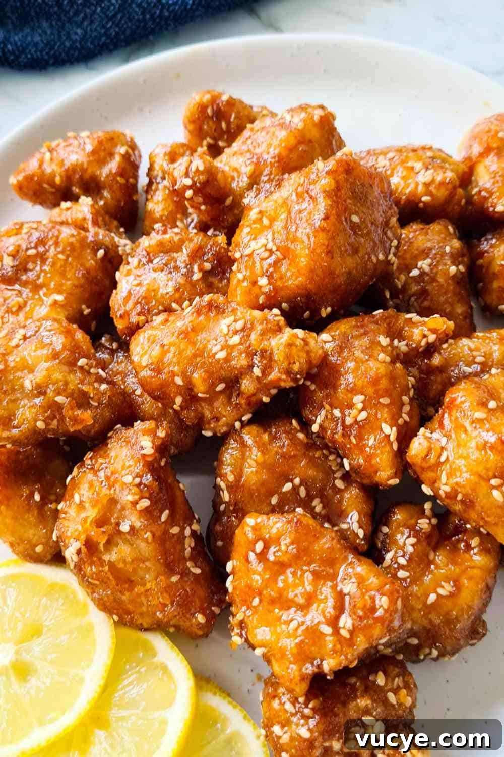 A plate of crispy glazed chicken bites