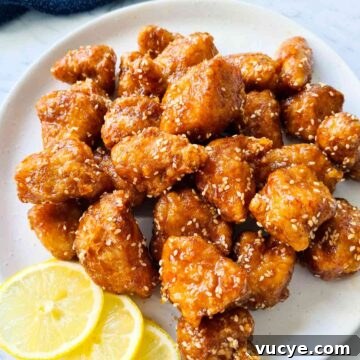 A plate of crispy glazed chicken bites