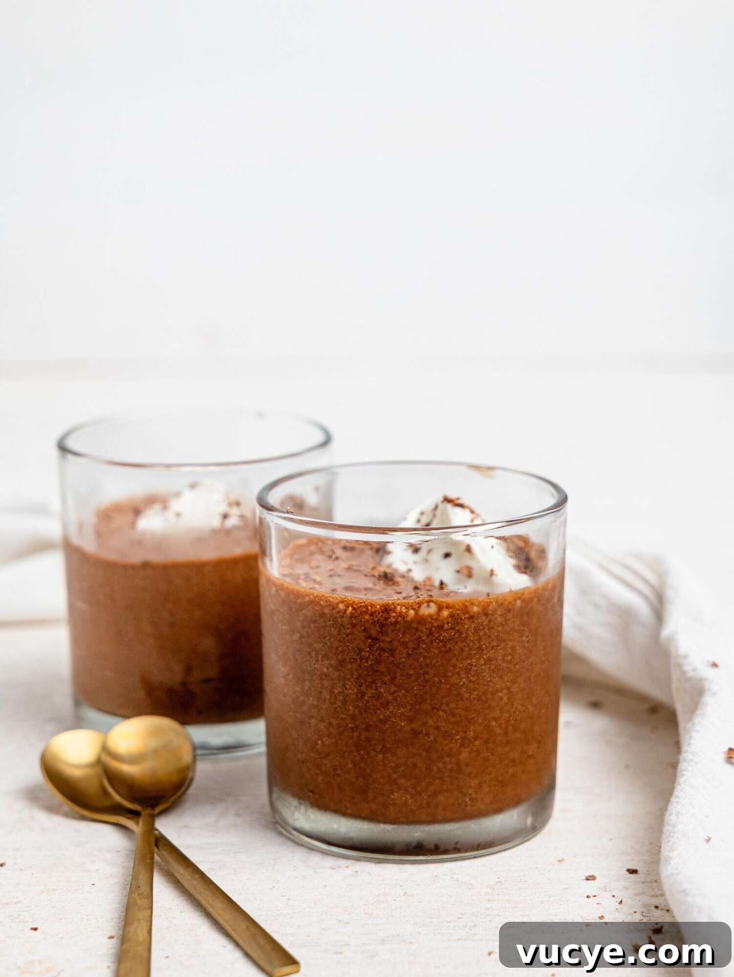 Two glasses of protein chocolate mousse.